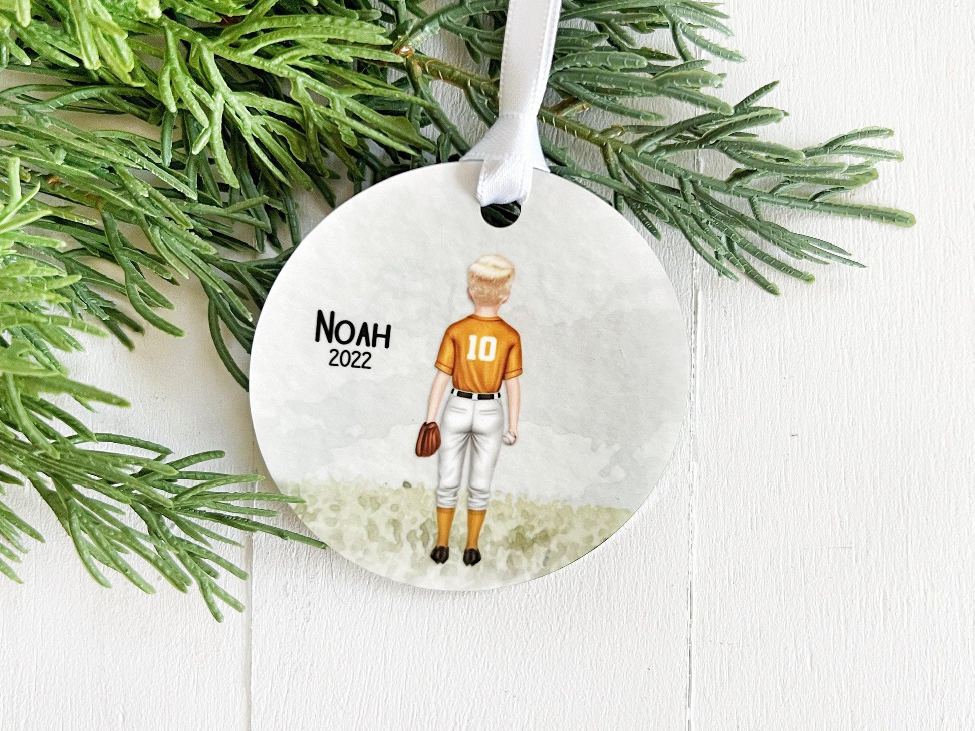 a snowman and a gingerbread man on a green and white background