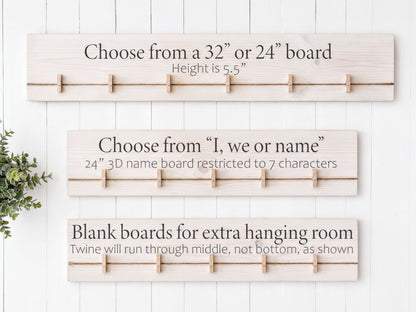 three different types of wooden name boards, each with a unique design and size, and they are mounted on a white wall.
