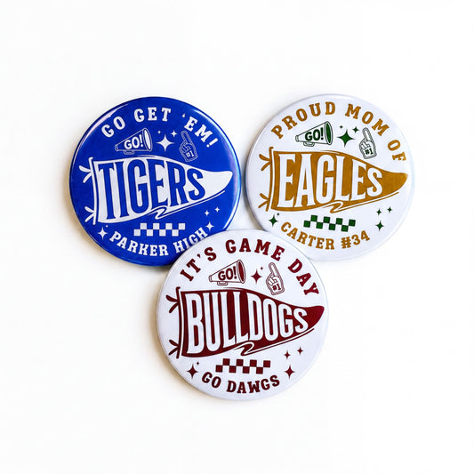 Three circular badges with text and graphics related to sports teams.