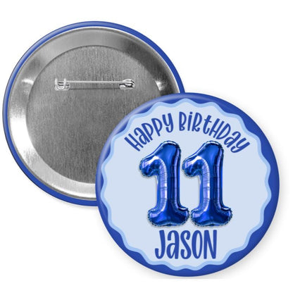 A round blue button with the text "Happy Birthday Jason 11" and a graphic of blue balloons representing the number 11.